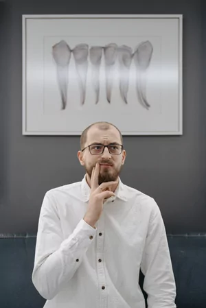 Man in dentist office for tooth extraction in Oklahoma City