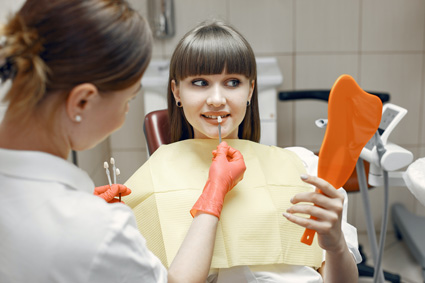 Patient receiving dental veneers near Moore and Norman, OK