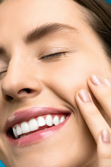 Woman with white teeth from teeth whitening in Oklahoma City, OK